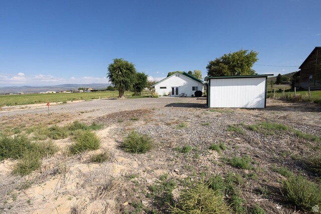 566 S Main St, Lyman, UT 84749 - view of yard featuring a rural view