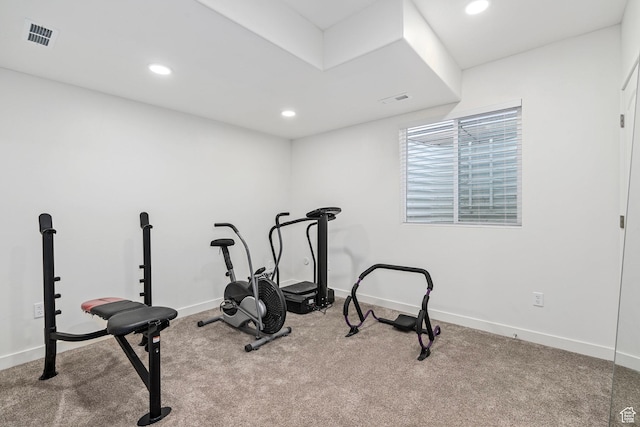 exercise room with visible vents, baseboards, carpet floors, and recessed lighting