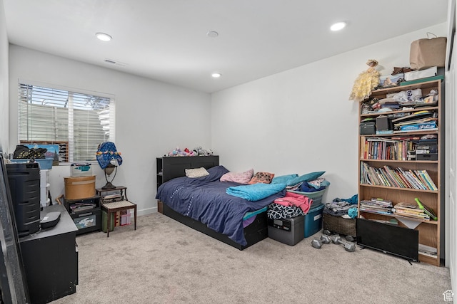 carpeted bedroom featuring visible vents and recessed lighting