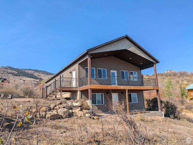 24 Marmot Ct, Fish Haven, ID 83287 - back of house featuring a mountain view