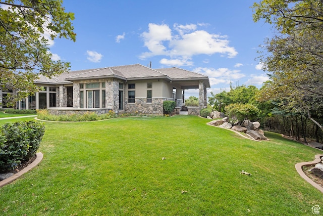 5210 Skyline Pkwy, Ogden, UT 84403 - rear view of property with stone siding, stucco siding, and a lawn