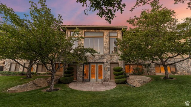 5210 Skyline Pkwy, Ogden, UT 84403 - rear view of house with a patio, stone siding, french doors, and a yard
