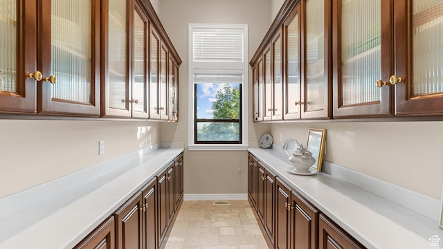 5210 Skyline Pkwy, Ogden, UT 84403 - bar with baseboards and stone tile flooring