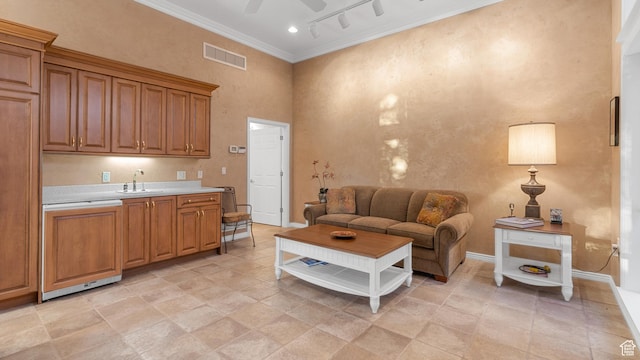 5210 Skyline Pkwy, Ogden, UT 84403 - living room with a ceiling fan, baseboards, visible vents, track lighting, and ornamental molding