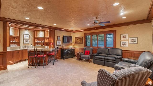 5210 Skyline Pkwy, Ogden, UT 84403 - living area featuring wet bar, ornamental molding, light carpet, and a textured ceiling