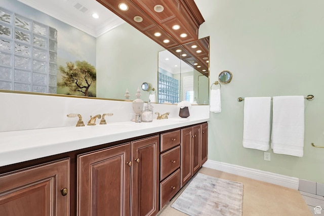 5210 Skyline Pkwy, Ogden, UT 84403 - bathroom featuring crown molding, a sink, baseboards, visible vents, and double vanity