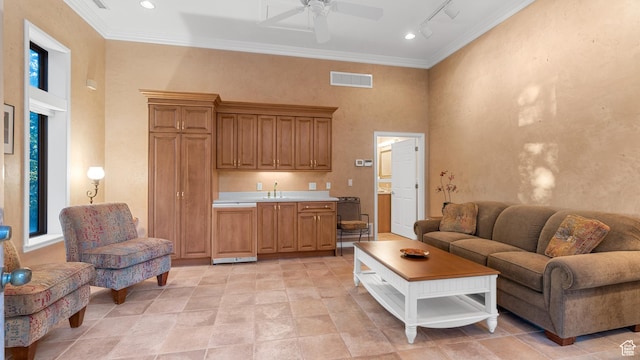5210 Skyline Pkwy, Ogden, UT 84403 - living area with track lighting, crown molding, ceiling fan, visible vents, and a towering ceiling