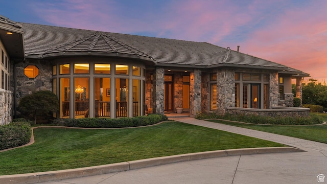 5210 Skyline Pkwy, Ogden, UT 84403 - view of front of property with stone siding and a lawn