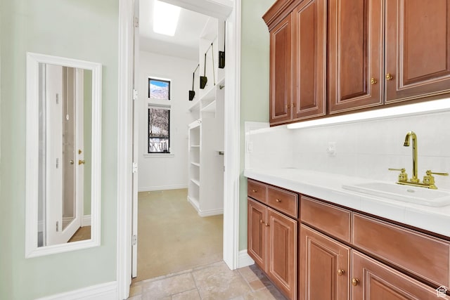 5210 Skyline Pkwy, Ogden, UT 84403 - interior space featuring light colored carpet, baseboards, and a sink