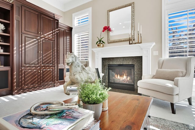 5210 Skyline Pkwy, Ogden, UT 84403 - living room featuring ornamental molding and a glass covered fireplace