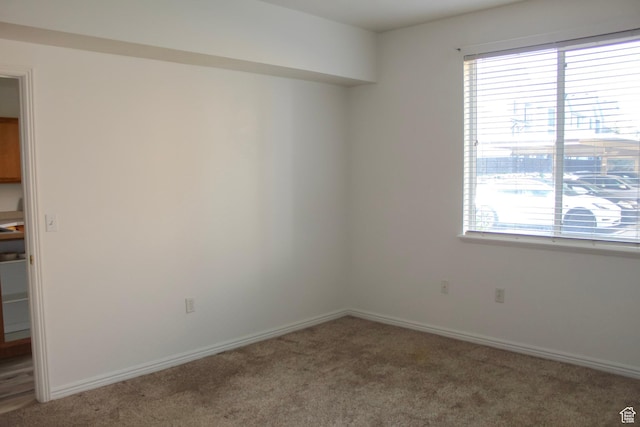 502 S 1040 E Unit 147, American Fork, UT 84003 - carpeted empty room featuring healthy amount of natural light and baseboards