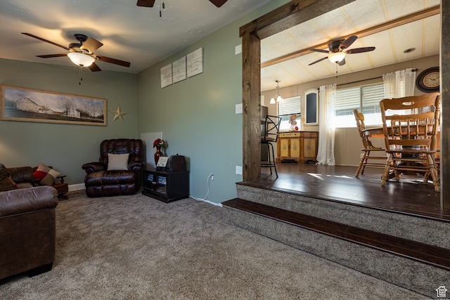 living room featuring ceiling fan and carpet flooring