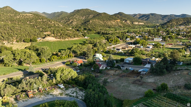 drone / aerial view featuring a rural view and a mountain view