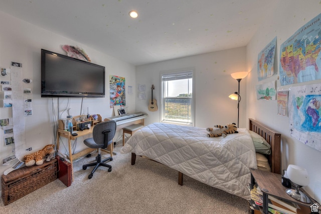 bedroom featuring carpet