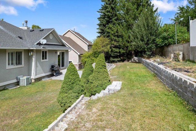 232 Bugle Way, Providence, UT 84332 - view of yard featuring a fenced backyard and central AC