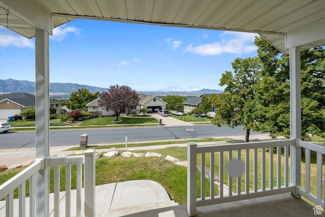 232 Bugle Way, Providence, UT 84332 - balcony with a residential view, a porch, and a mountain view