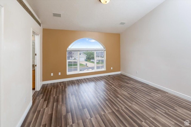 232 Bugle Way, Providence, UT 84332 - spare room featuring baseboards, visible vents, wood finished floors, and a textured ceiling