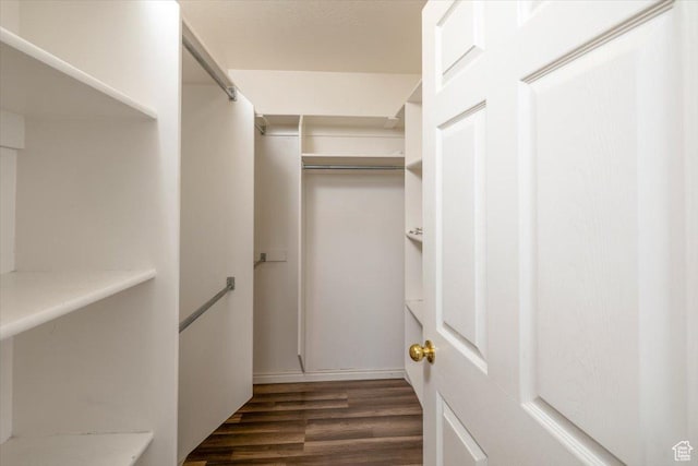 232 Bugle Way, Providence, UT 84332 - walk in closet featuring wood finished floors