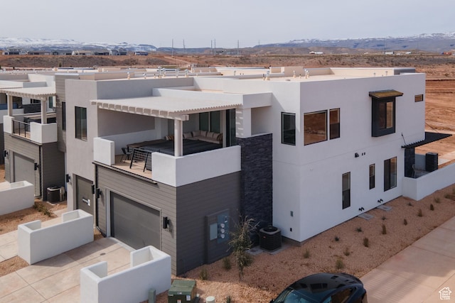 5394 S Aquamarine Ln, St George, UT 84790 - view of building exterior featuring a garage and central air condition unit