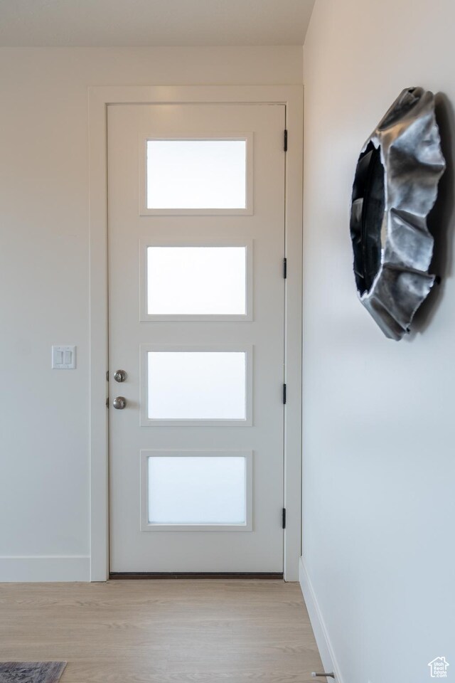 5394 S Aquamarine Ln, St George, UT 84790 - doorway with light wood-type flooring and a wealth of natural light