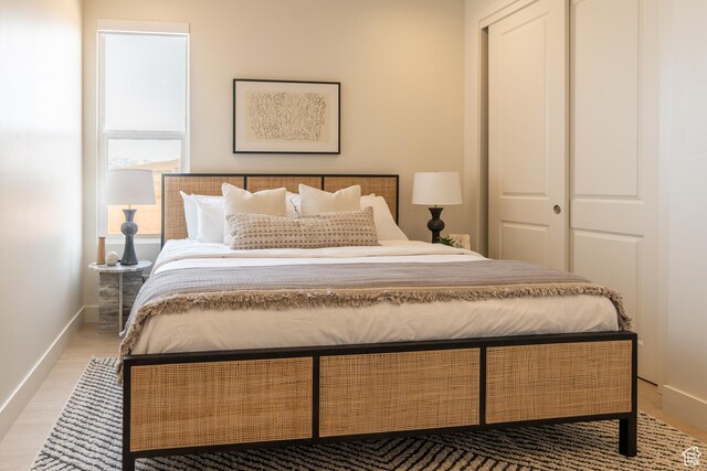 5394 S Aquamarine Ln, St George, UT 84790 - bedroom with light wood-type flooring and a closet