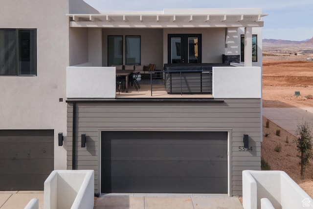 5394 S Aquamarine Ln, St George, UT 84790 - exterior space with a garage and a balcony
