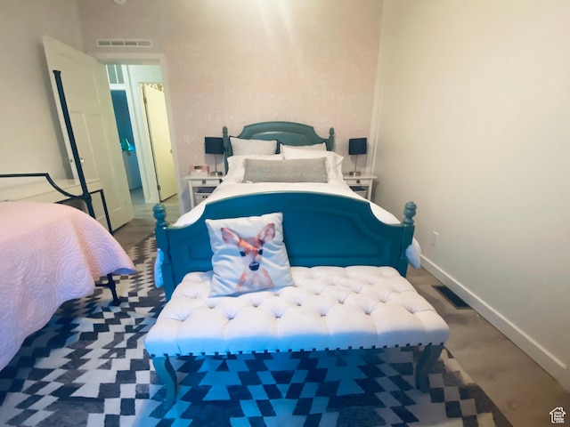 594 S Aspen Dr Unit 48, Garden City, UT 84028 - bedroom with baseboards and visible vents