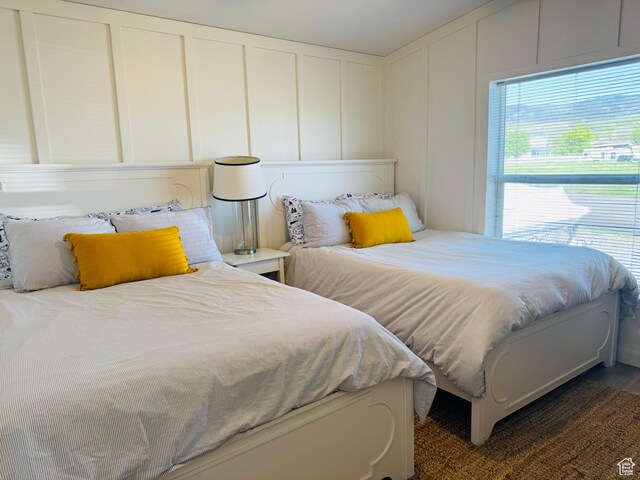 594 S Aspen Dr Unit 48, Garden City, UT 84028 - bedroom with a decorative wall