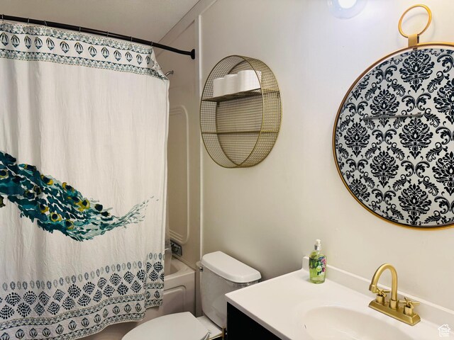 594 S Aspen Dr Unit 48, Garden City, UT 84028 - full bathroom with vanity, toilet, and shower / bath combo
