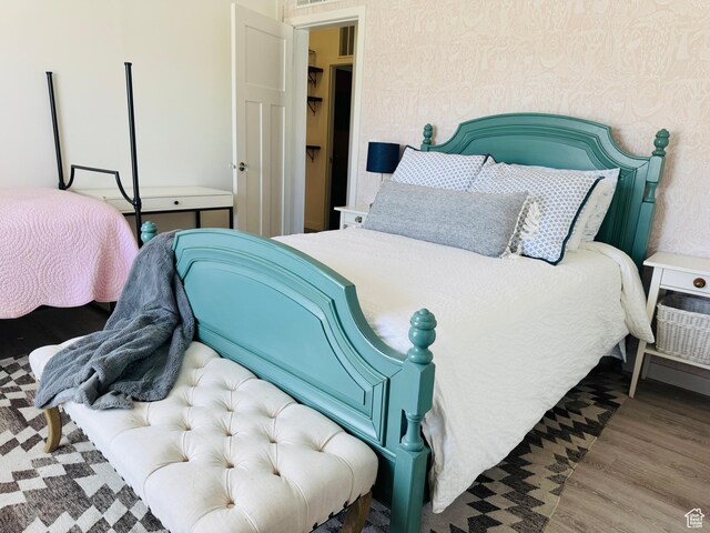 594 S Aspen Dr Unit 48, Garden City, UT 84028 - bedroom with wood finished floors
