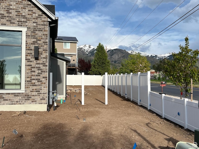 1136 N 1875 E Unit 1, Layton, UT 84040 - fenced backyard with a mountain view