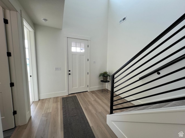 1136 N 1875 E Unit 1, Layton, UT 84040 - entryway with wood finished floors, baseboards, and stairs
