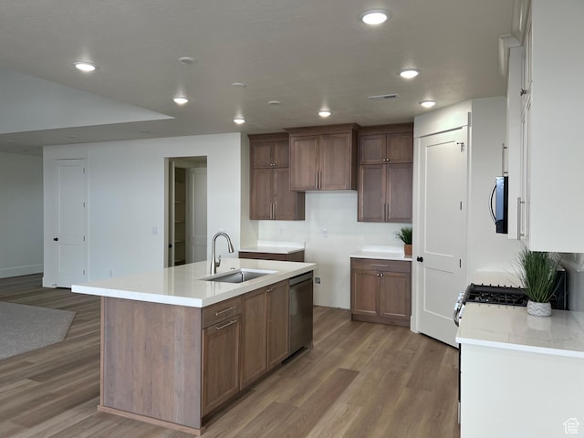 1136 N 1875 E Unit 1, Layton, UT 84040 - kitchen featuring a sink, dishwasher, light wood-type flooring, a center island with sink, and recessed lighting