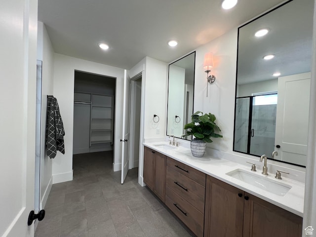 1136 N 1875 E Unit 1, Layton, UT 84040 - full bathroom featuring double vanity, a stall shower, recessed lighting, and baseboards