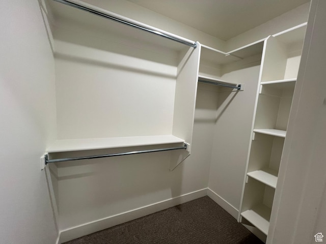 1136 N 1875 E Unit 1, Layton, UT 84040 - walk in closet featuring dark carpet