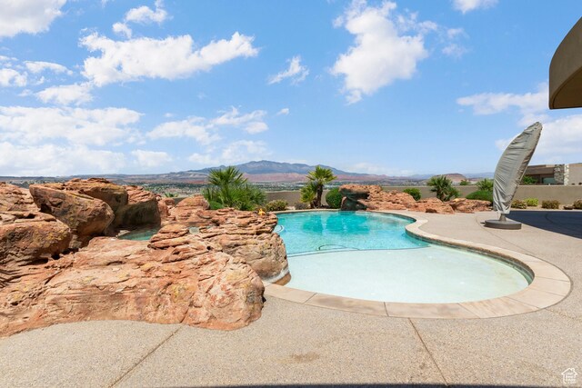 2596 E Flint St, St George, UT 84790 - pool with a patio and a mountain view