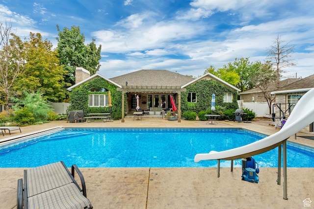 2768 W Country Classic Dr, Bluffdale, UT 84065 - view of pool featuring a fenced in pool, a patio, a pergola, a water slide, and fence