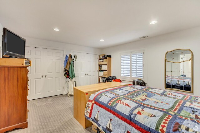 2768 W Country Classic Dr, Bluffdale, UT 84065 - bedroom with recessed lighting, visible vents, light colored carpet, and multiple closets