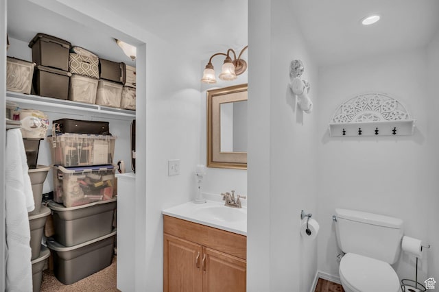 2218 W 2575 N, Cedar City, UT 84721 - bathroom featuring toilet, vanity, and recessed lighting