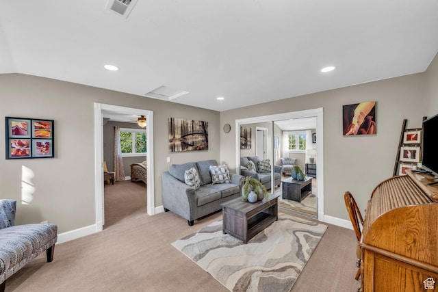 2218 W 2575 N, Cedar City, UT 84721 - living room featuring a healthy amount of sunlight, attic access, visible vents, and light colored carpet