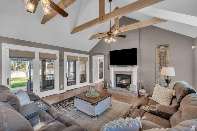 2218 W 2575 N, Cedar City, UT 84721 - living area with ceiling fan, a brick fireplace, wood finished floors, and beam ceiling