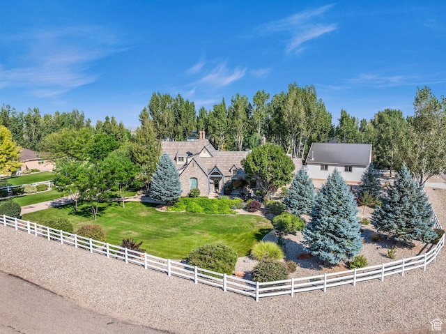 2218 W 2575 N, Cedar City, UT 84721 - view of front of home featuring a rural view, fence, and a front lawn