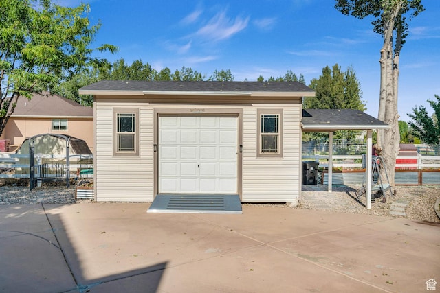 2218 W 2575 N, Cedar City, UT 84721 - garage featuring concrete driveway and fence