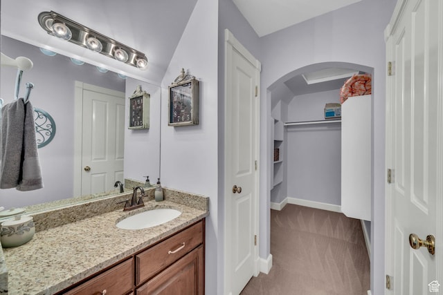 2218 W 2575 N, Cedar City, UT 84721 - bathroom with baseboards, a walk in closet, and vanity