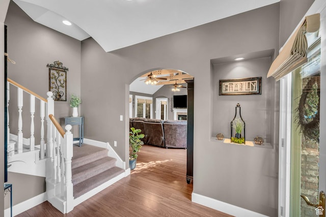 2218 W 2575 N, Cedar City, UT 84721 - foyer featuring arched walkways, stairway, baseboards, and wood finished floors