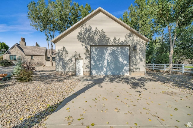 2218 W 2575 N, Cedar City, UT 84721 - view of side of property with a garage, concrete driveway, fence, and an outdoor structure