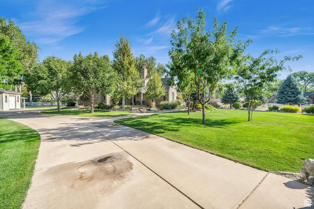 2218 W 2575 N, Cedar City, UT 84721 - view of property's community featuring a garage, concrete driveway, and a yard