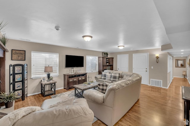 2218 W 2575 N, Cedar City, UT 84721 - living room with light wood-style floors, baseboards, and visible vents