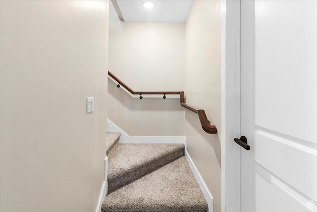 stairway featuring carpet floors, baseboards, and recessed lighting