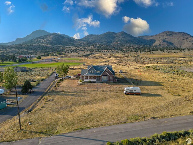 mountain view featuring a rural view